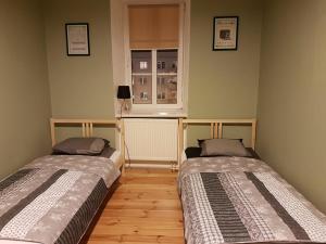 Кровать или кровати в номере 42-200 Hostel