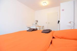 Ein Bett oder Betten in einem Zimmer der Unterkunft Private rooms next to subway