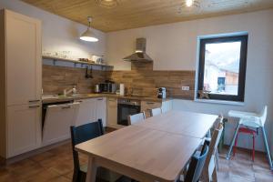 A kitchen or kitchenette at Wellness privát Štyri Lipy