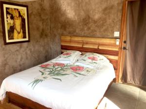 Postel nebo postele na pokoji v ubytování B&B Oui Madame