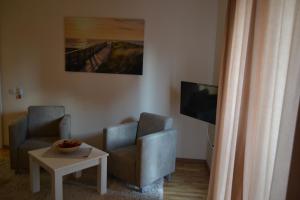 Televiisor ja/või meelelahutuskeskus majutusasutuses B&B Alex18