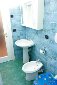 Vonios kambarys apgyvendinimo įstaigoje Relax e mare