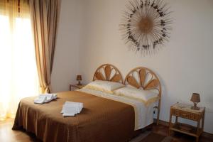 Postel nebo postele na pokoji v ubytování B&B Otranto 100 mt mare