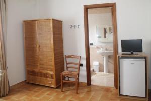 TV a/nebo společenská místnost v ubytování B&B Otranto 100 mt mare