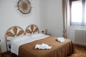 Postel nebo postele na pokoji v ubytování B&B Otranto 100 mt mare