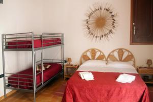 Postel nebo postele na pokoji v ubytování B&B Otranto 100 mt mare + 17 fotografií