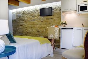 Una cocina o zona de cocina en Numa Rúa Travesa