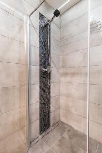 Kúpeľňa v ubytovaní APARTAMENTY GORZÓW WLKP.