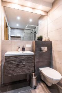Kúpeľňa v ubytovaní APARTAMENTY GORZÓW WLKP.