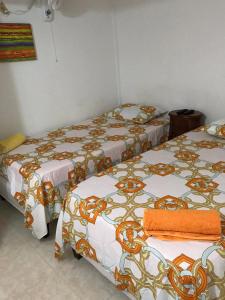 Cama o camas de una habitación en Posada Martha´s Place