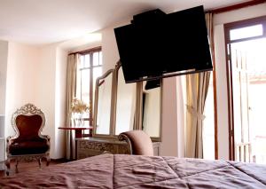 TV a/nebo společenská místnost v ubytování Rio Hotel
