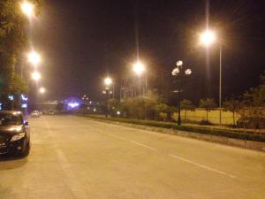 a car parked on a street at night with street lights at ninh binh friendly hotel in Ninh Binh