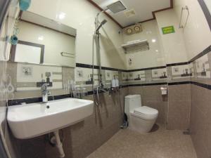 a bathroom with a sink and a toilet at ninh binh friendly hotel in Ninh Binh