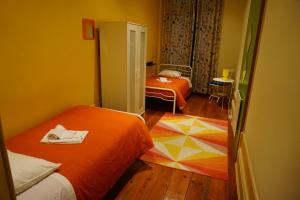 Postel nebo postele na pokoji v ubytování CoolHostel