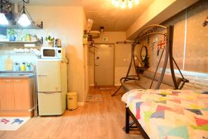 Kuchyň nebo kuchyňský kout v ubytování Residence Unicorn