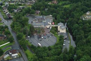 an aerial view of a parking lot with cars at Glenavon House Hotel in Cookstown