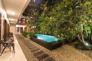 Bazén v ubytování The Pavilion Hotel Kuta nebo v jeho okolí