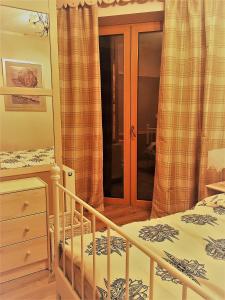 Posteľ alebo postele v izbe v ubytovaní Apartament KościeliSKI