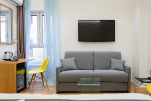TV a/nebo společenská místnost v ubytování Kalamonjo Suite&Rooms