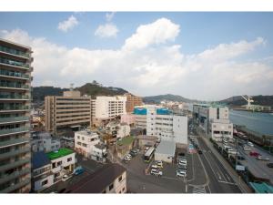 a view of a city with buildings and a street at Onomichi Daiichi Hotel in Onomichi