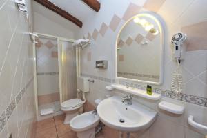 Koupelna v ubytování Hotel L'Esagono