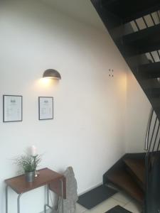 Den Skaldede Kok Guesthouse tesisinde bir oturma alanı