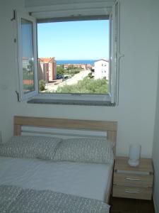 Posteľ alebo postele v izbe v ubytovaní Apartment Bellavista