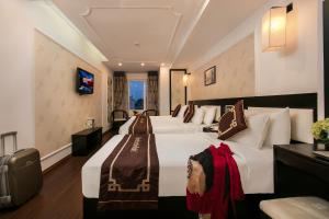 TV a/nebo společenská místnost v ubytování Hanoi Emotion Hotel