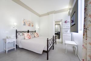 Postel nebo postele na pokoji v ubytování Zephyros Hotel