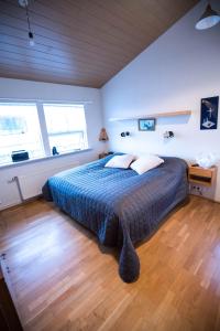 Katil atau katil-katil dalam bilik di Eiði Farmhouse