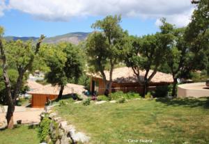 a view of the house from the garden at casa suara in Afa