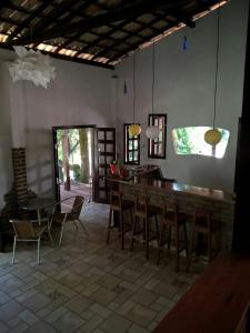 Reštaurácia alebo iné gastronomické zariadenie v ubytovaní Vivenda Peixe Pequeno
