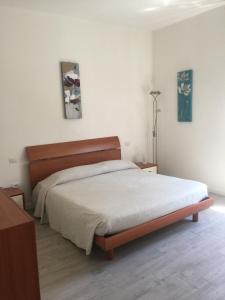 Posteľ alebo postele v izbe v ubytovaní Appartamenti Giada