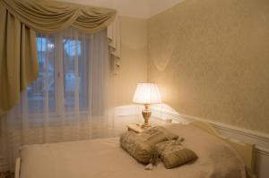 Llit o llits en una habitació de Ranna Luxury Apartment