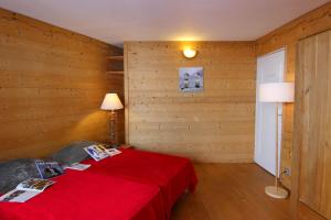 Säng eller sängar i ett rum på Roc de Peclet Appartements VTI