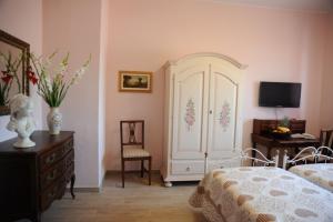 Postel nebo postele na pokoji v ubytování B&B Paola e Francesco