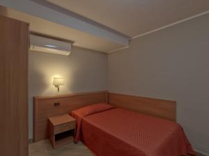 Postel nebo postele na pokoji v ubytování Terme Di Monte Valenza