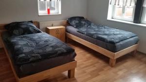 Postel nebo postele na pokoji v ubytování Baunaeck