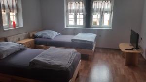 Postel nebo postele na pokoji v ubytování Baunaeck + 5 fotografií