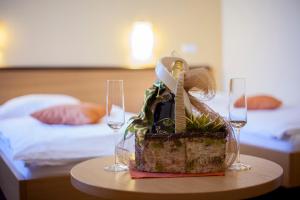 Postel nebo postele na pokoji v ubytování Hotel Bela Krajina