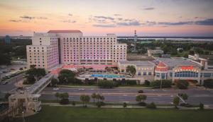 an aerial view of a large hotel with a parking lot at Harrah's Gulf Coast Hotel & Casino - A Caesars Rewards Destination in Biloxi +62 photos