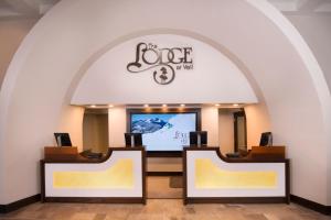 an entrance to a store with a large screen in a building at Lodge at Vail, A RockResort in Vail