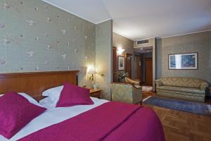 Katil atau katil-katil dalam bilik di Hotel Palazzo Lovera