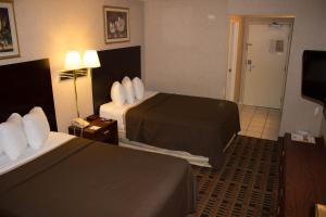 Postel nebo postele na pokoji v ubytování Days Inn by Wyndham Amarillo East