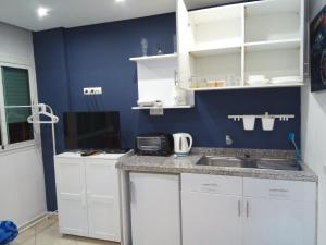 Кухня или мини-кухня в Studios Taha
