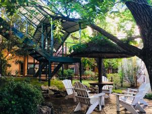 Сад в Los Espinillos Hotel y Spa