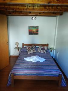 Postel nebo postele na pokoji v ubytování Casa Campo