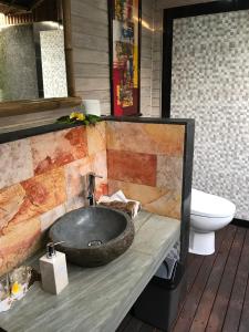 A bathroom at The Jingga Villas