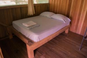 Кровать или кровати в номере Albergue La Laguna