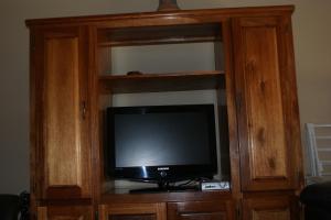 A television and/or entertainment center at Eric's Apartments